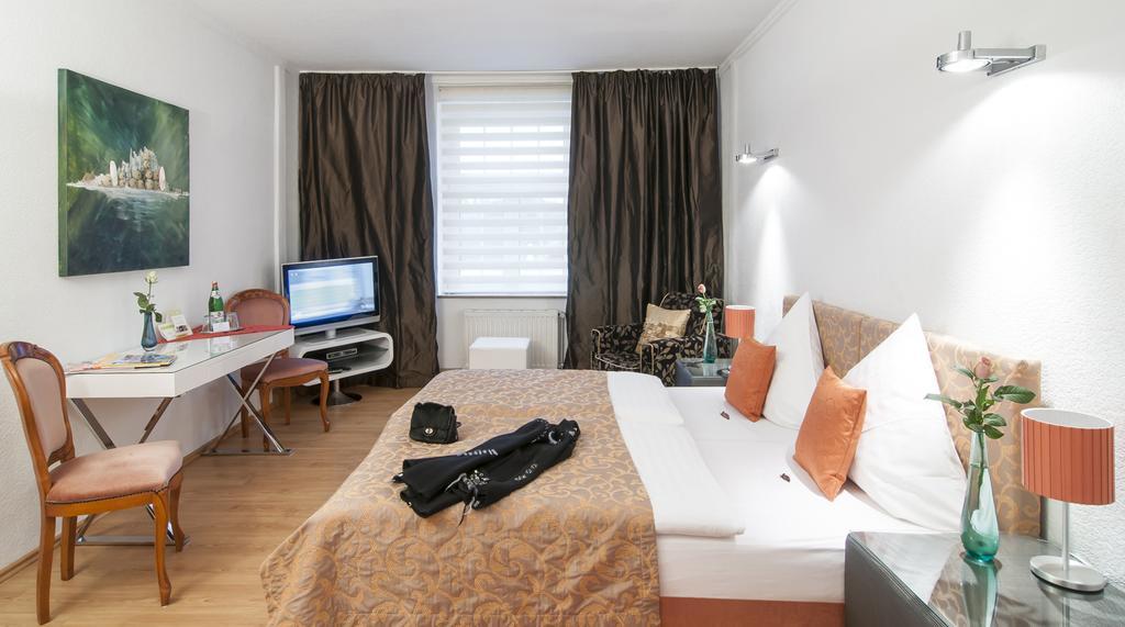 Hotel Service Apartments Am Prinzenplatz Kamp-Lintfort Oda fotoğraf
